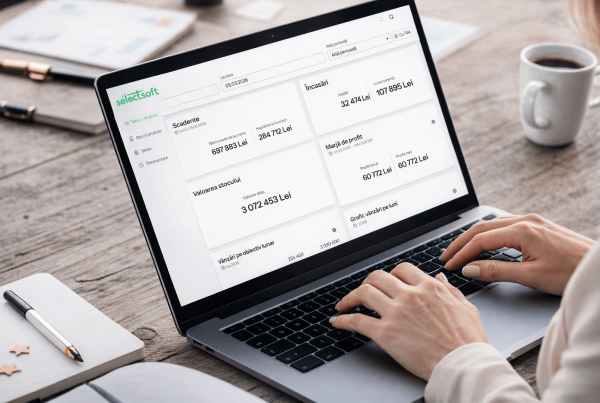 Manager analizează pe laptop un dashboard KPI cu indicatori de performanță ai companiei